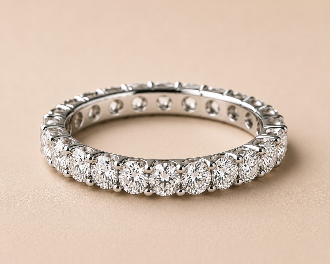 Brilliant-cut diamond eternity band shown at an angle